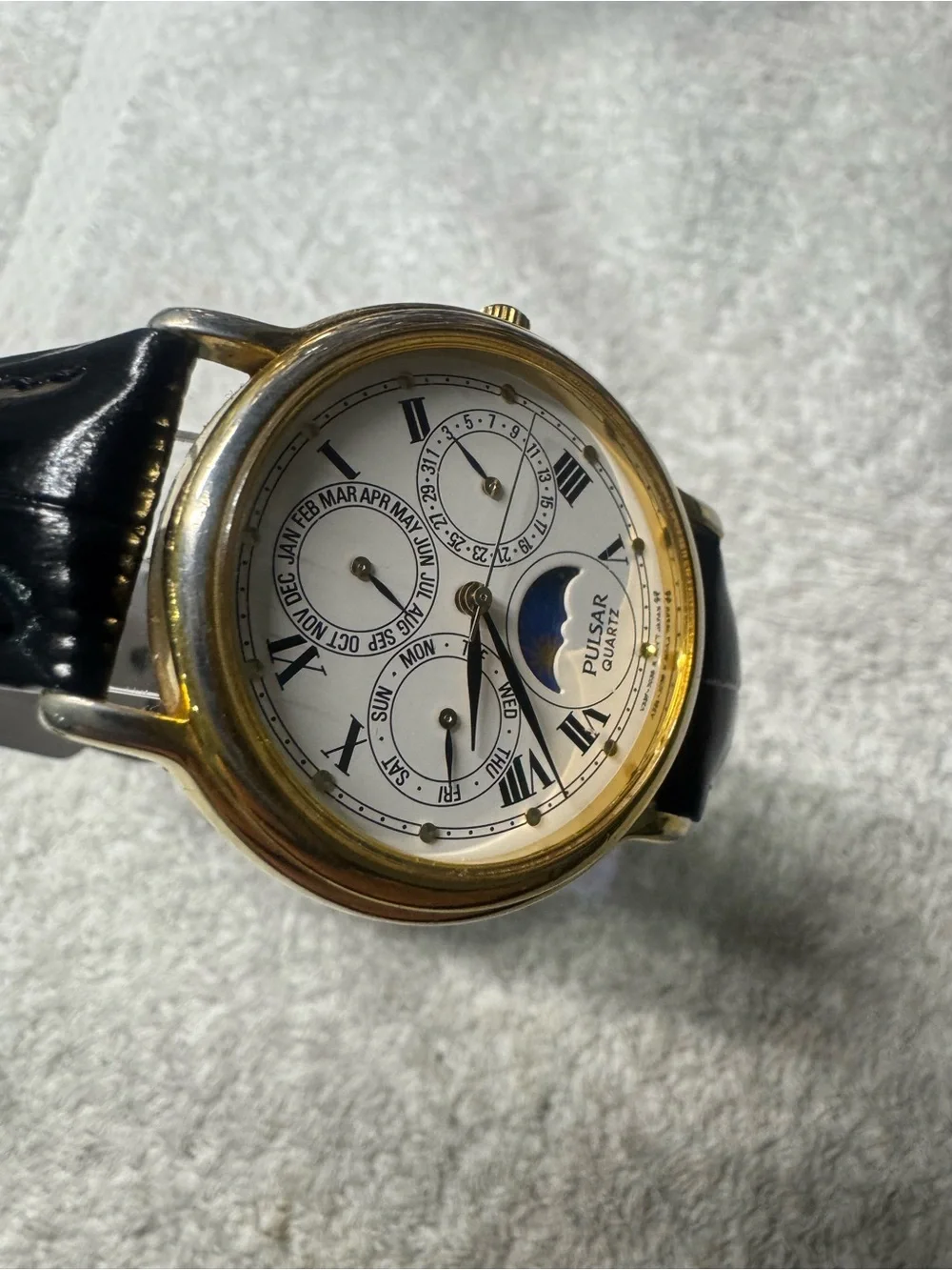 Pulsar Gold-Tone Case White Dial Black Leather Strap Moonphase Watch